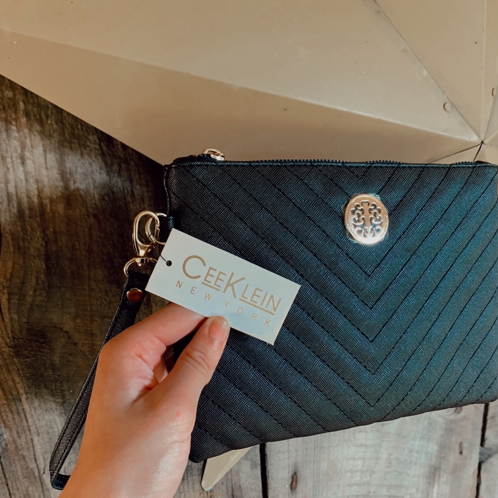 A Cee Klein wristlet (color black)